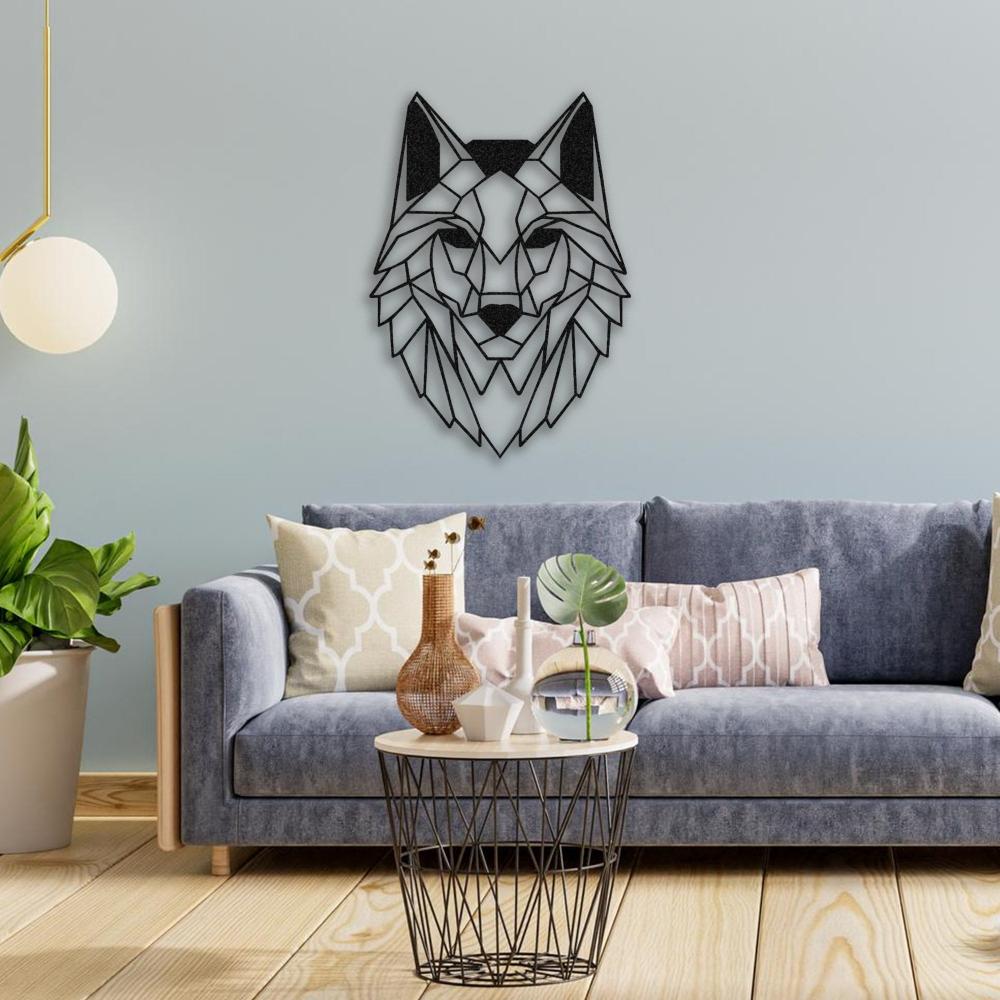 alpha wolf metal wall art on the sofa