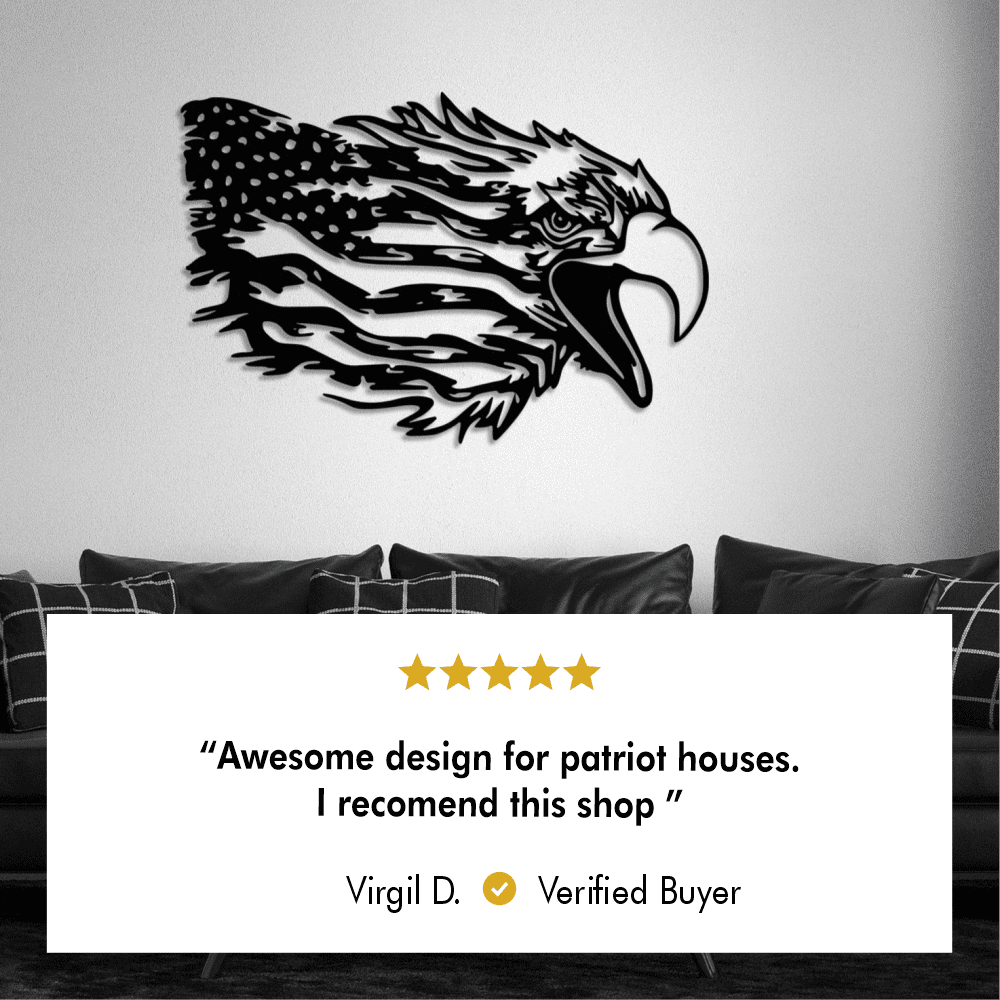 American-themed eagle metal wall art with flag-inspired details, mounted above a dark leather couch with plaid pillows. A 5-star review is displayed below, stating: "Awesome design for patriot houses. I recommend this shop" by Virgil D., a verified buyer.