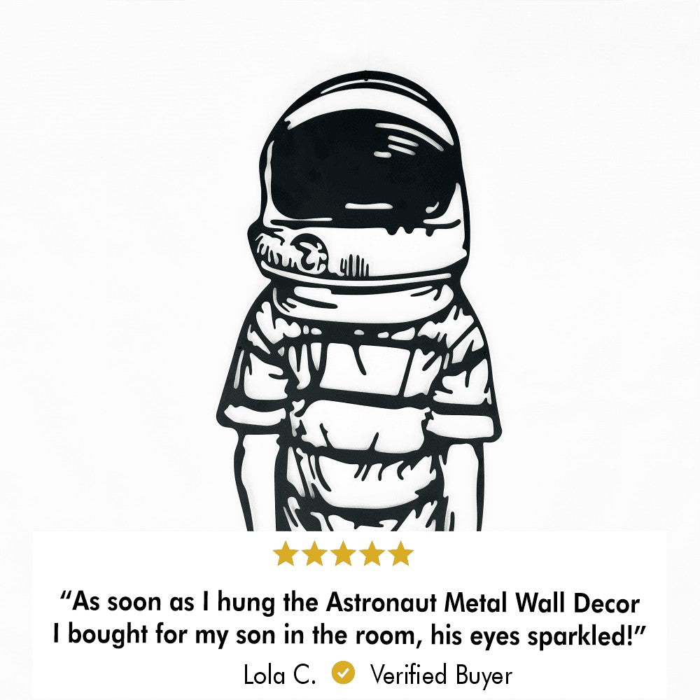 Close-up view of astronaut metal wall decor with a verified customer review praising its impact as a gift for a child.