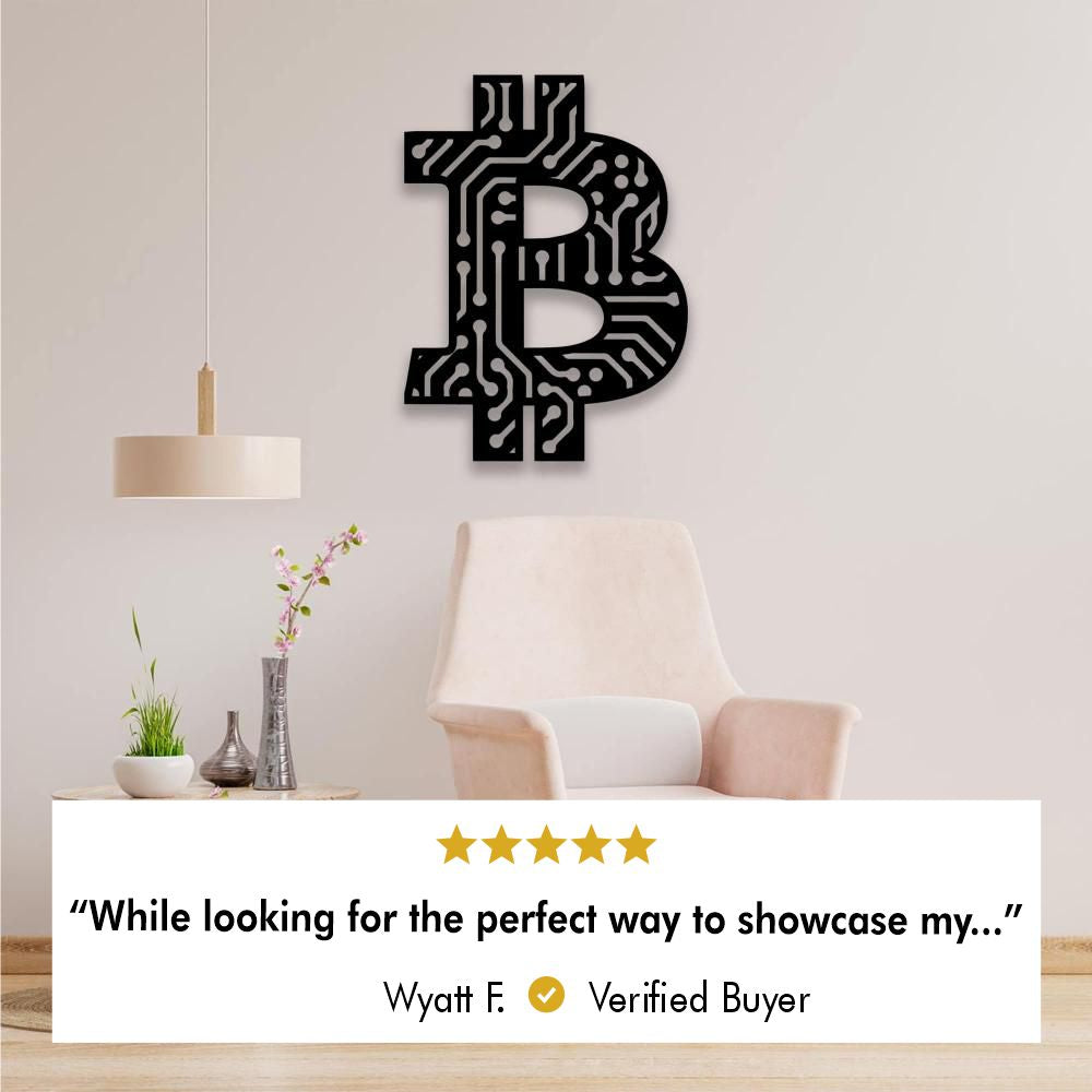 Metal wall art of a Bitcoin symbol with a circuit board design above a wooden bench with five star review from verified buyer Wyatt F. : "While looking for the perfect way toı showcase my..."