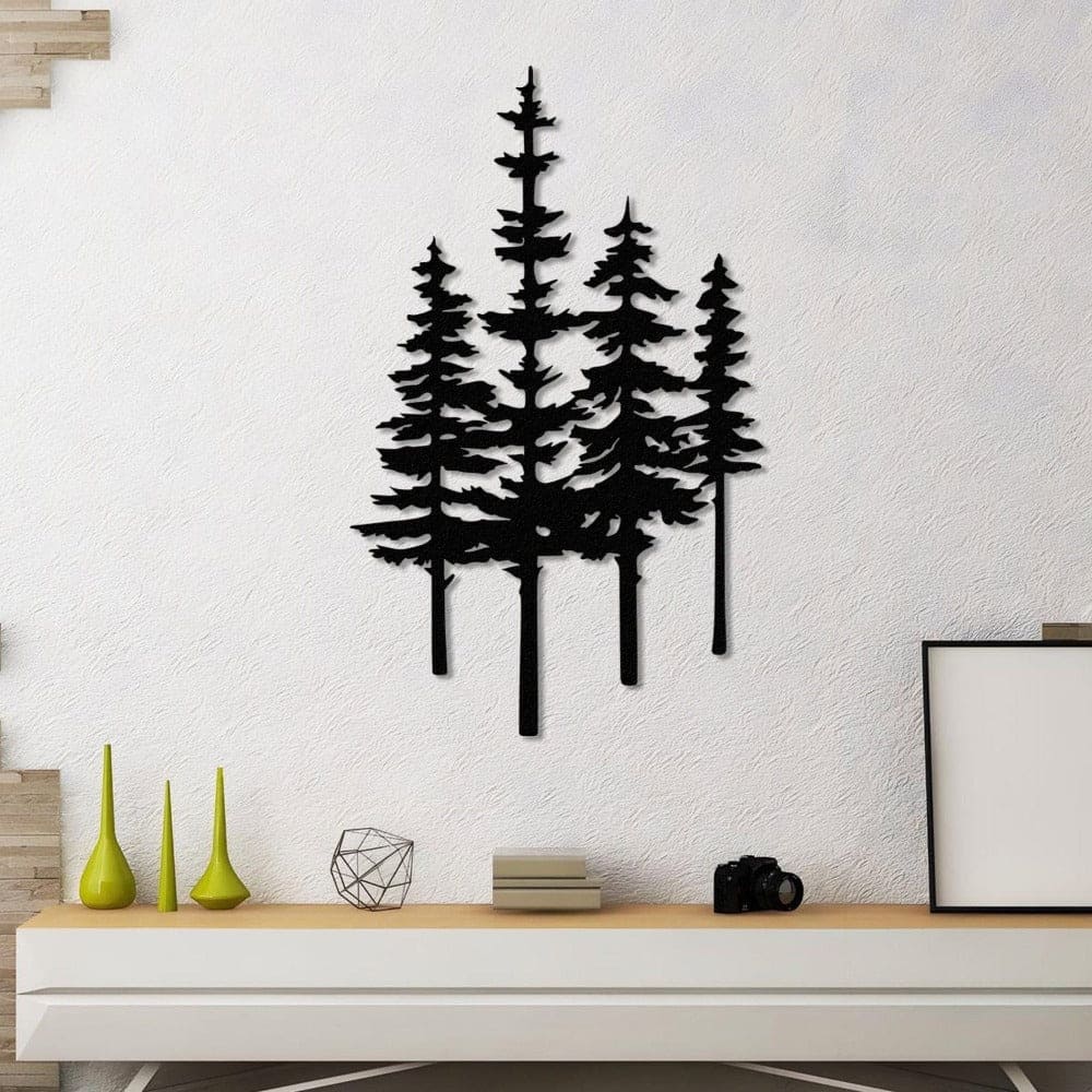 Black metal pine tree wall art displayed above a modern white console table with decorative vases and a minimalist design, creating a serene living room ambiance.