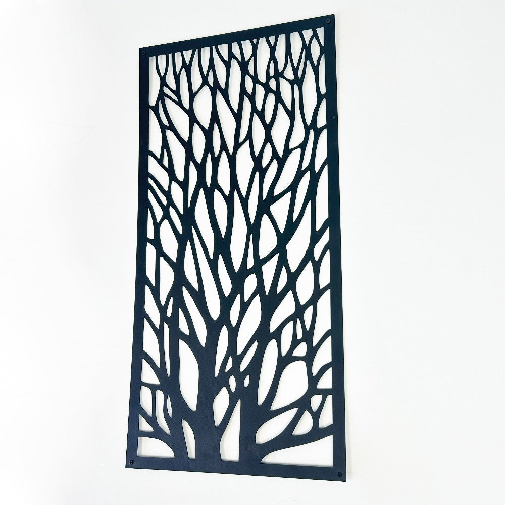 Close-up view of a black tree silhouette metal wall art showcasing its intricate branch design against a plain white background. The precision of the cut and the sturdy metal frame are highlighted.