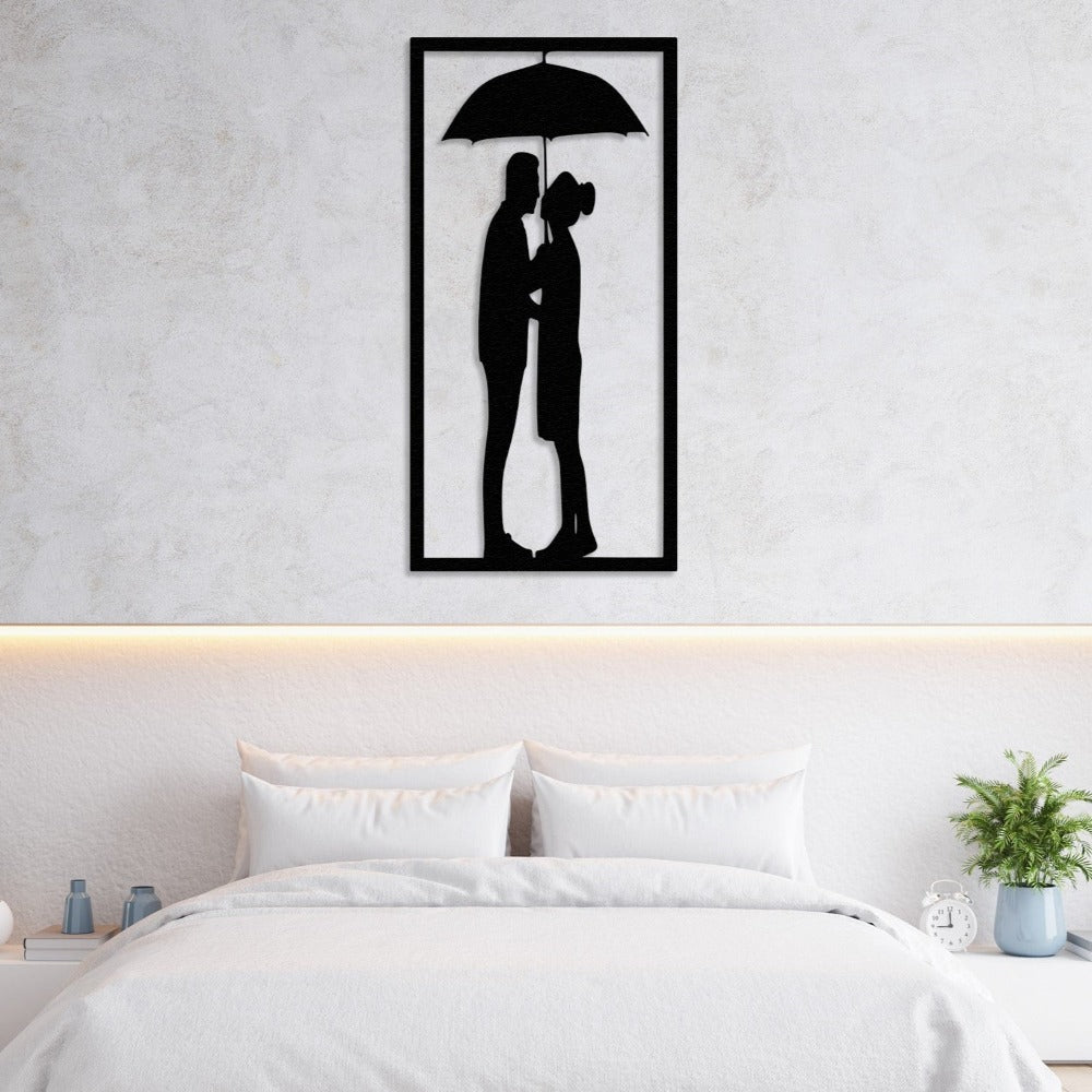 couple under the umbrella metal wall art above  bed decor