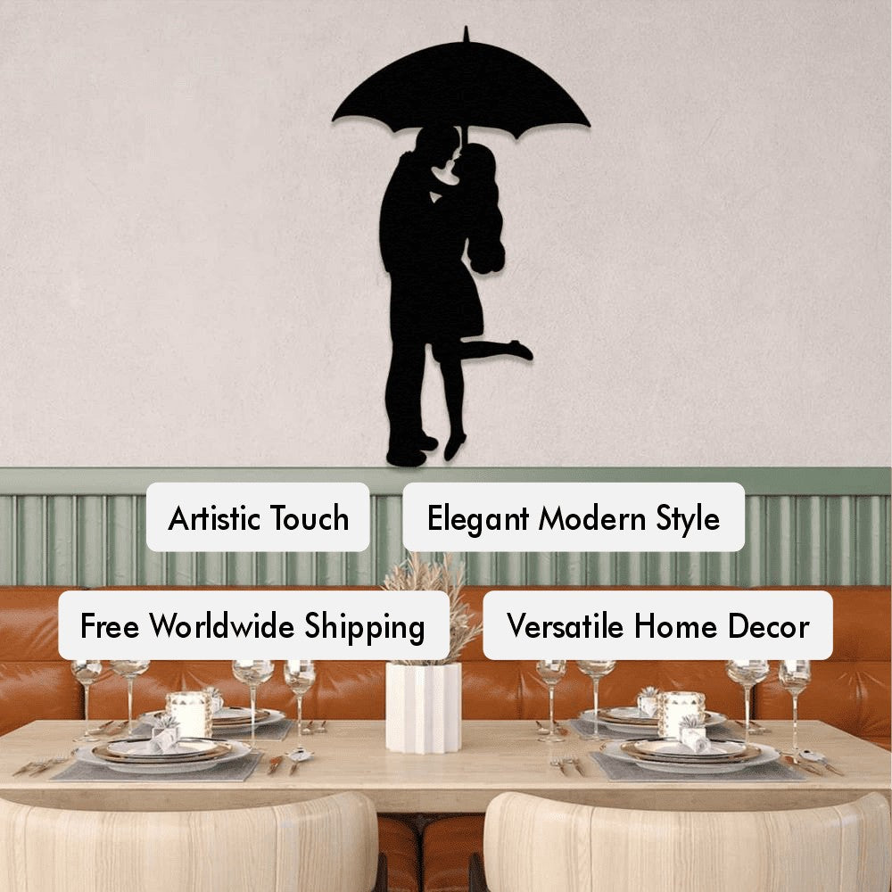 A metal wall art piece depicting a couple under an umbrella, mounted above a dining area. The decor adds an artistic and modern touch to the space, with key features such as "Artistic Touch," "Elegant Modern Style," "Free Worldwide Shipping," and "Versatile Home Decor" highlighted.