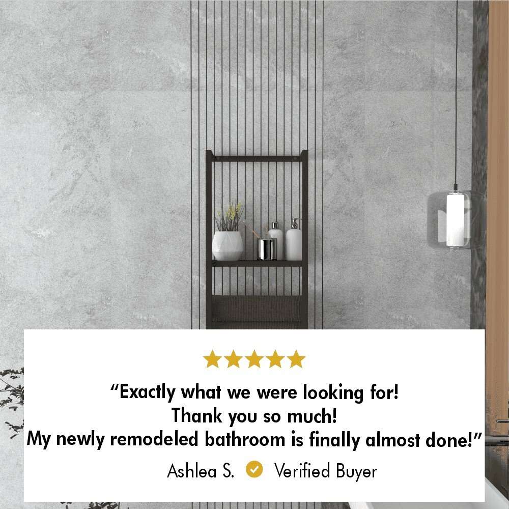 A customer review image showing the floating shelf mounted on a bathroom wall, with a testimonial reading, "Exactly what we were looking for! Thank you so much! My newly remodeled bathroom is finally almost done!"