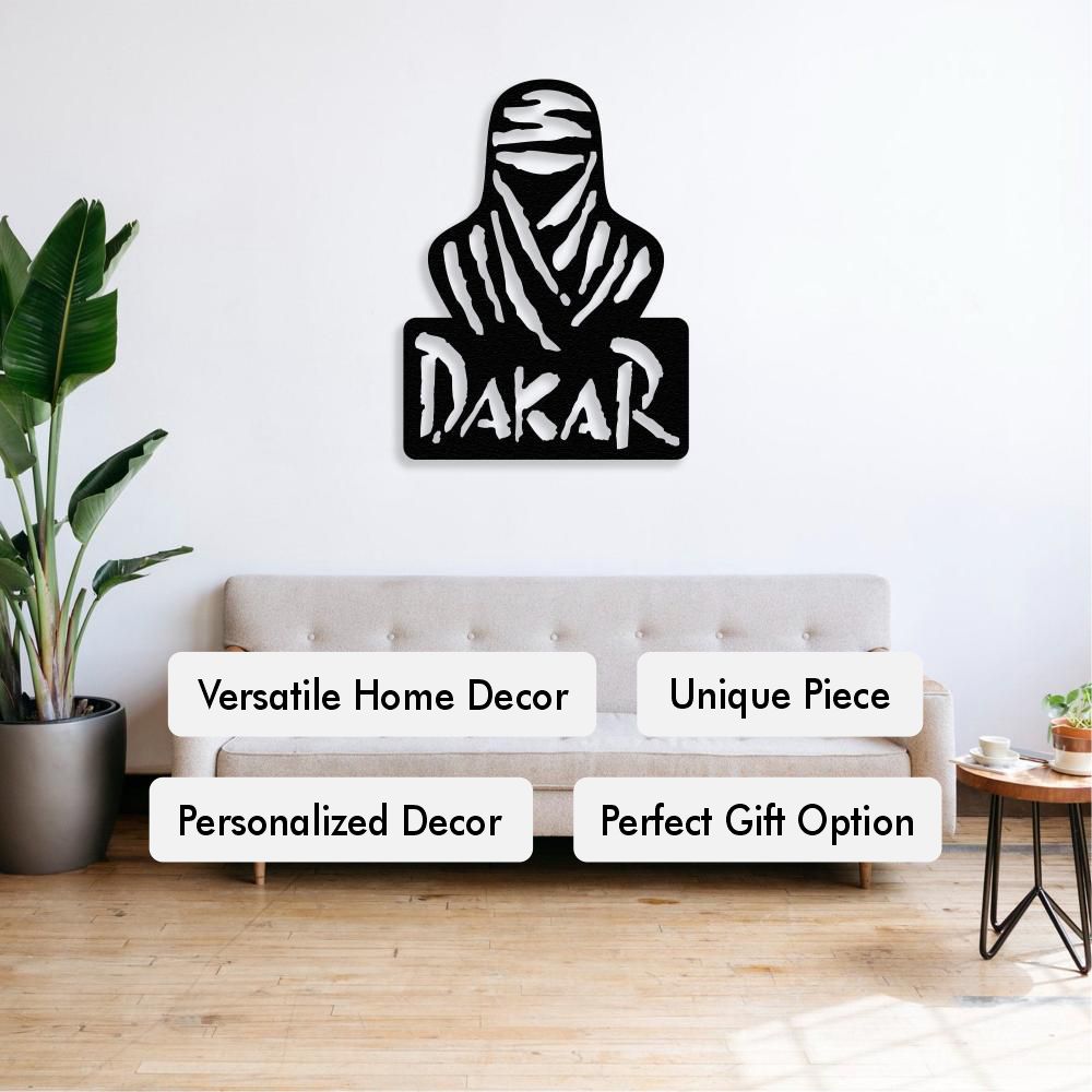 A stylized metal wall art piece depicting a hooded figure with the word "DAKAR" below, mounted above a sofa in a modern living room. Labels stating: Versatile Home Decor, Unique Piece, Personalized Decor, Perfect Gift Option.