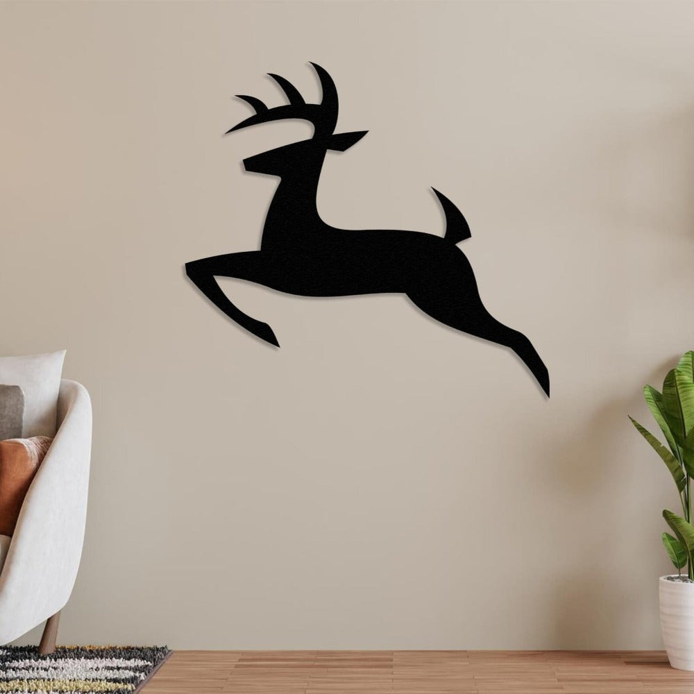 deer siliuet metal wall decor on the wall