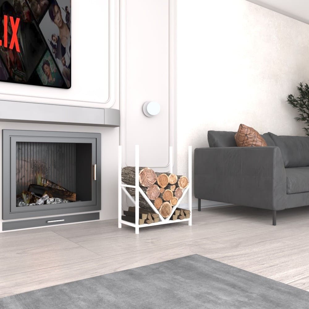 A white metal firewood rack with a modern geometric design, filled with neatly stacked firewood, situated beside a fireplace in a bright and contemporary living room