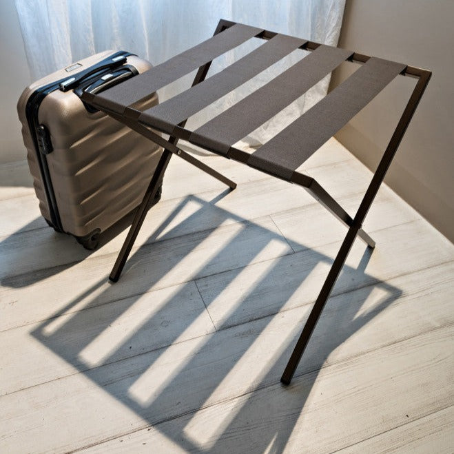 foldable metal luggage rack with genuie leather carson with suitcase