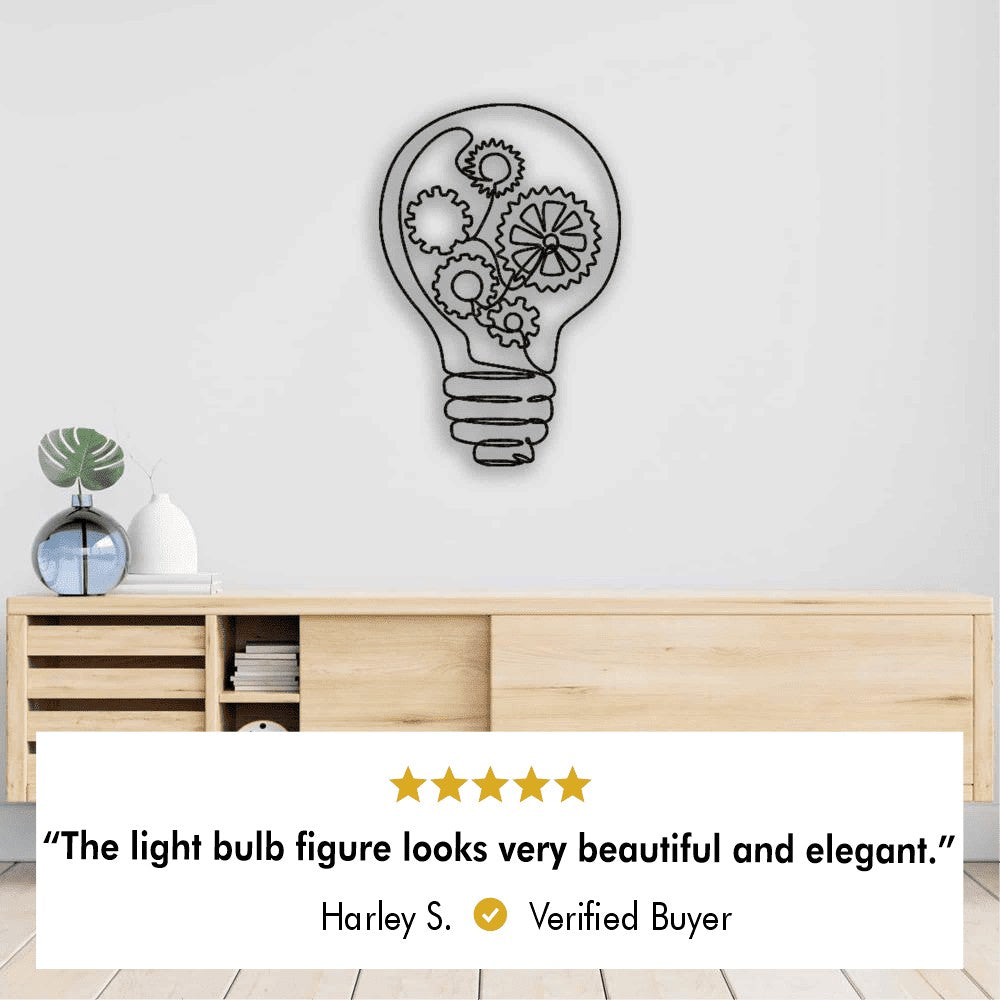 Light bulb metal wall art featuring intricate gear designs mounted on a minimalist shelf wall, with a 5-star customer review stating, "The light bulb figure looks very beautiful and elegant." – Harley S., Verified Buyer.