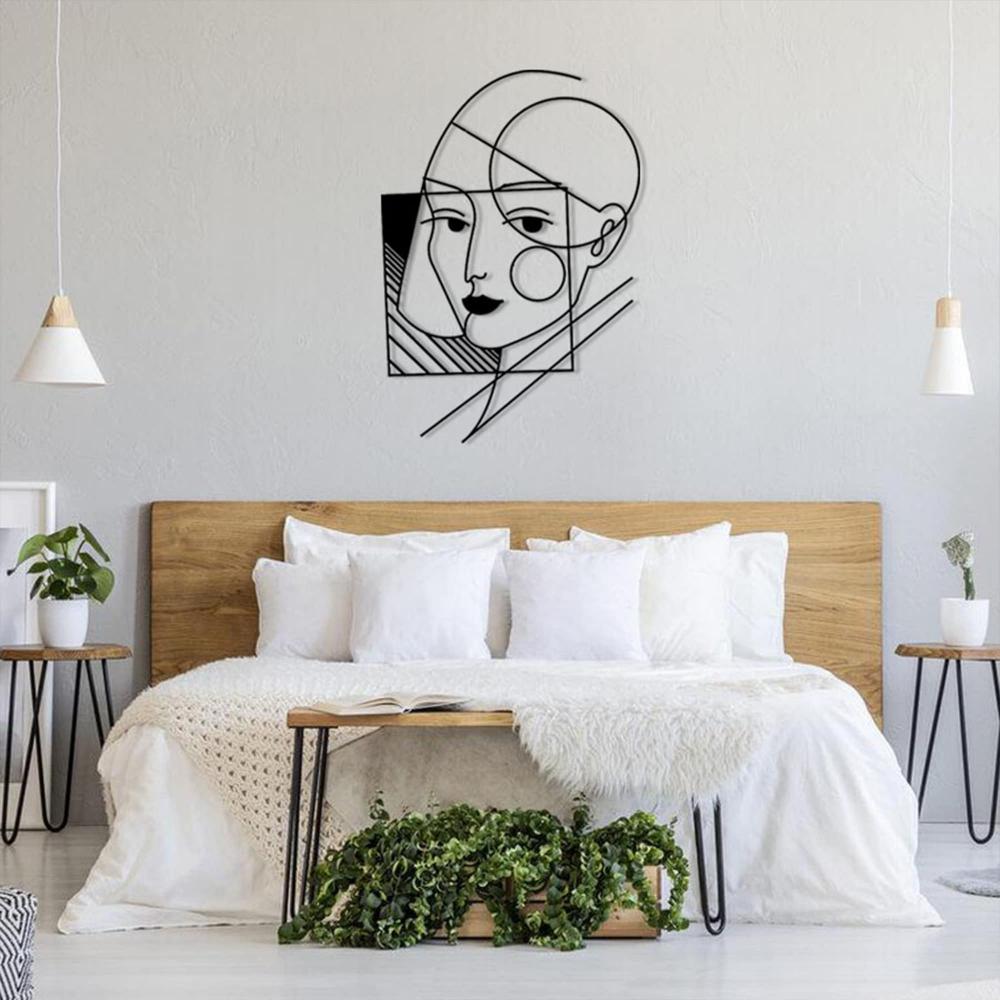 geometric lady wall art on the bad