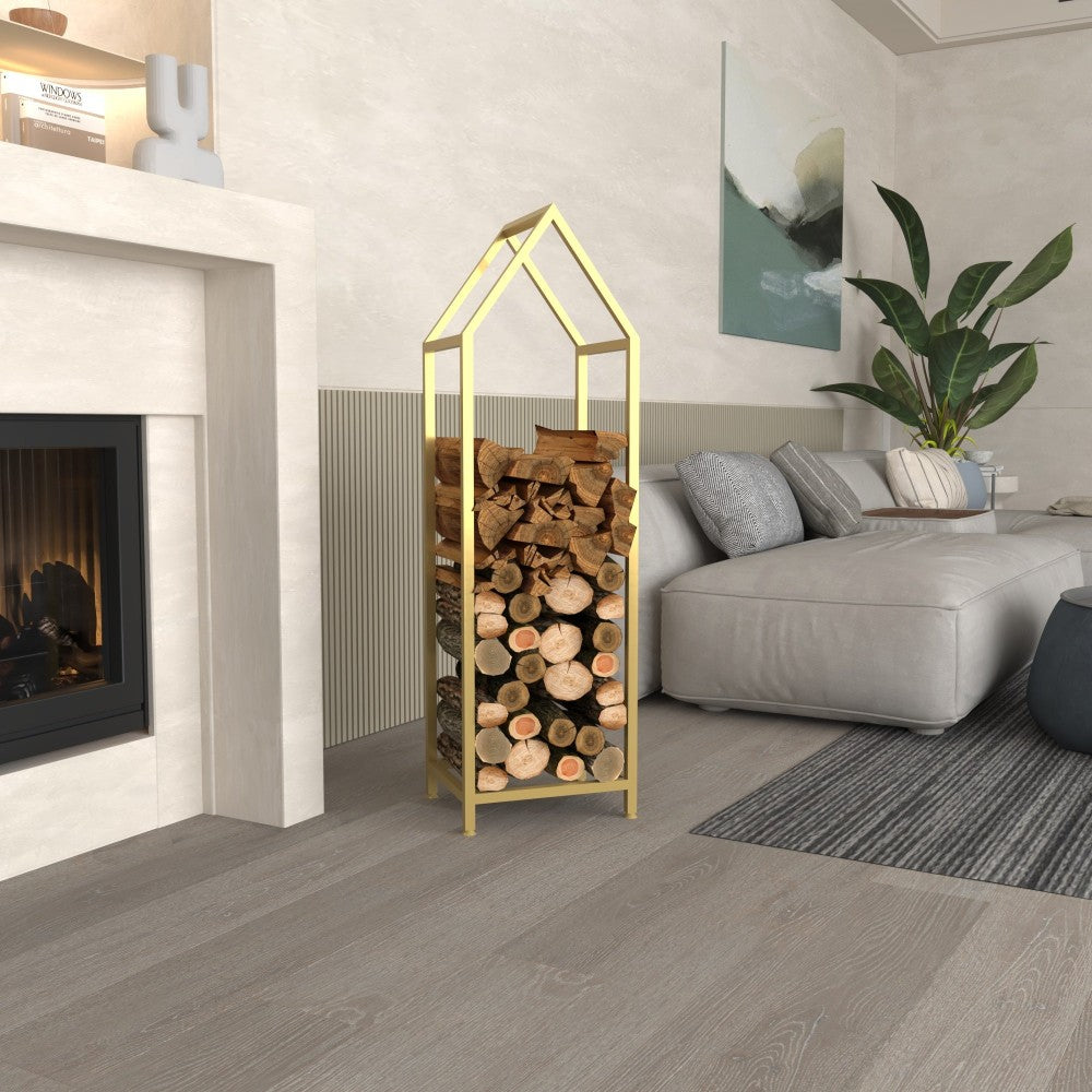 A gold house-shaped firewood rack neatly holding firewood, placed in a stylish living room with neutral tones and contemporary decor