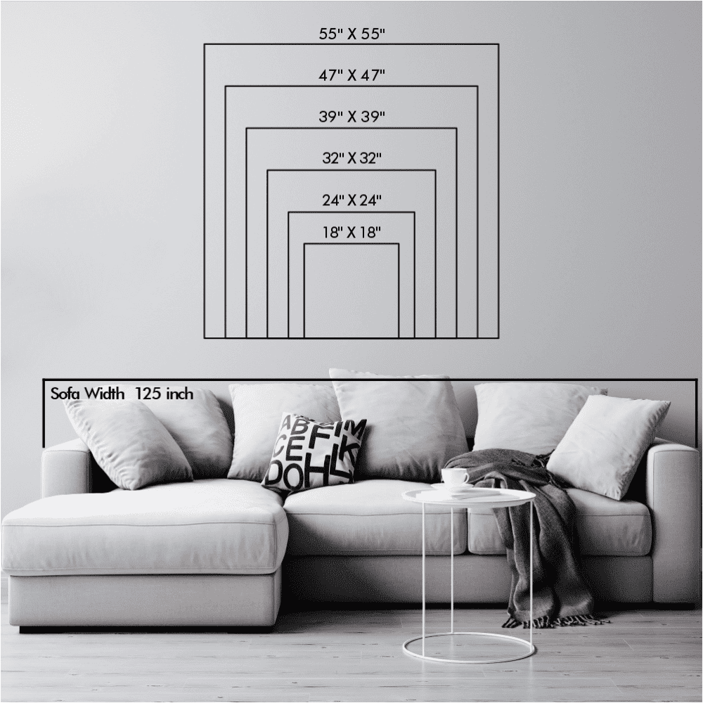 Size chart showing various dimensions of the Halloween-themed jack-o'-lantern metal wall decor in relation to a sofa for scale.