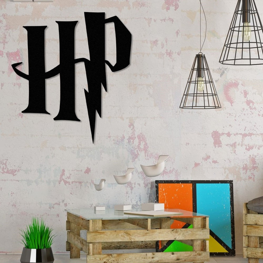 Black Harry Potter "HP" metal logo with a lightning bolt design mounted on a textured wall in a modern industrial room, featuring wooden pallet furniture, colorful wall art, and decorative elements.