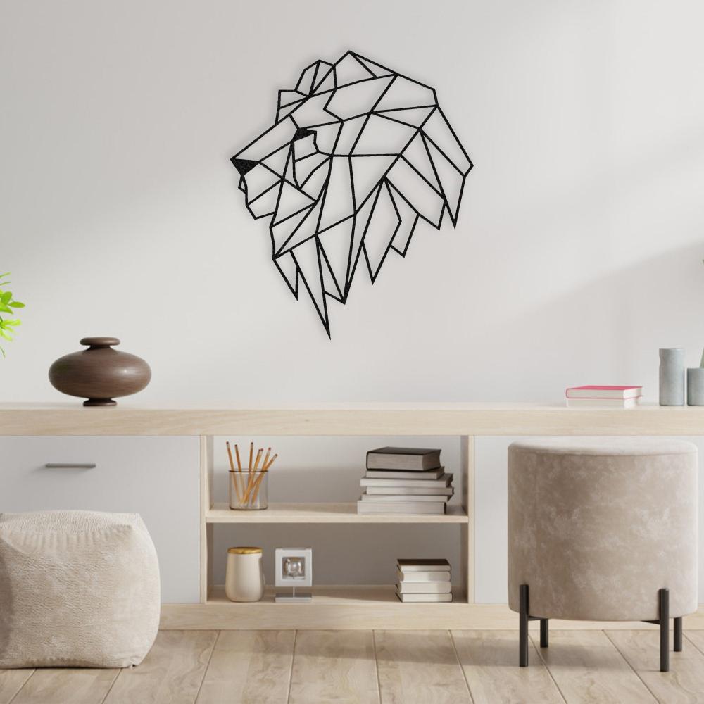 A geometric lion head metal wall art hung above a minimalist desk setup with books and decor, creating a clean and organized aesthetic.