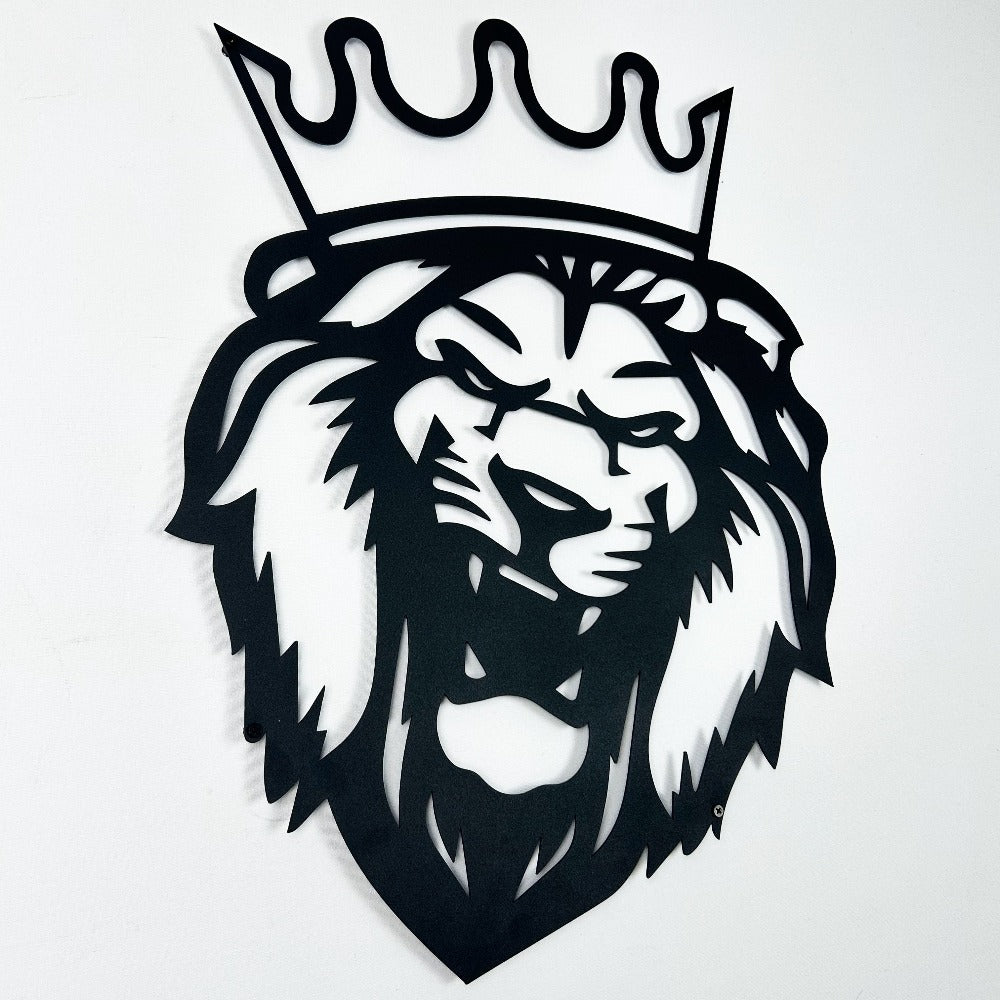 Black metal lion head wall art with a crown, showcasing intricate and bold design details against a white background.