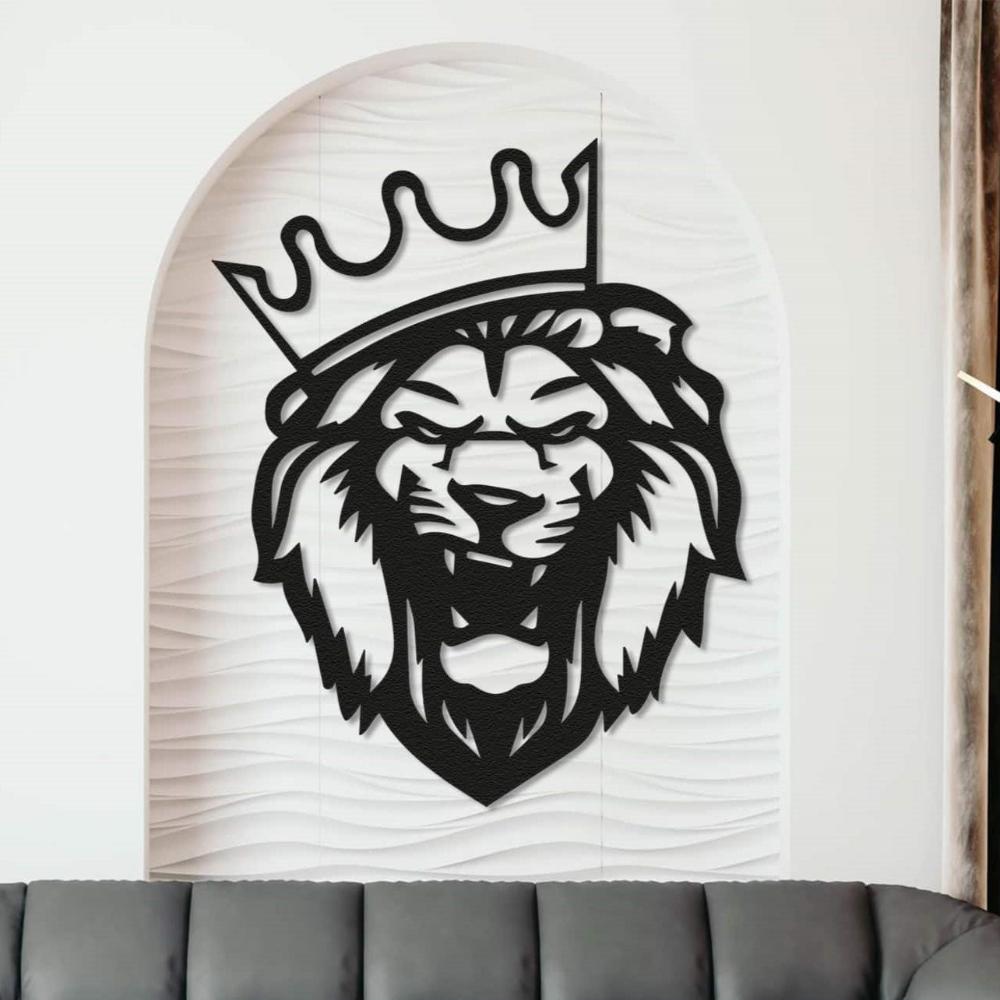 Black metal lion head wall art with a crown mounted on a textured white arched wall, positioned above a dark gray sofa, creating a bold and regal decor statement.