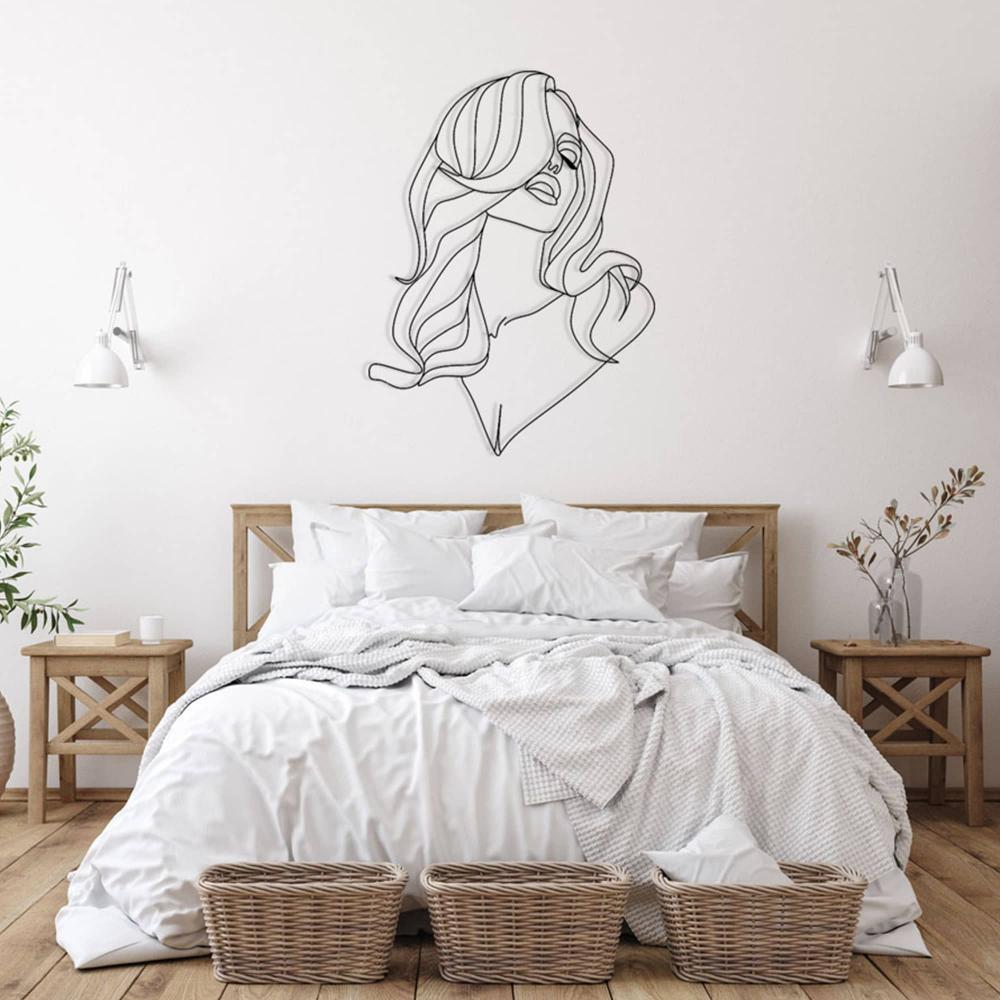 long hair lady metal wall decor on the bad