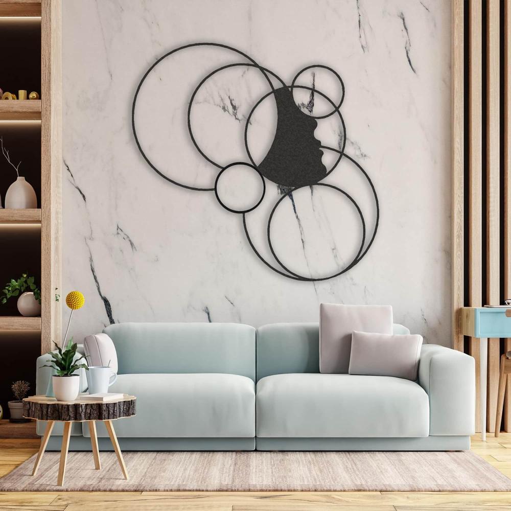 metal decor with girl and circles Living Room