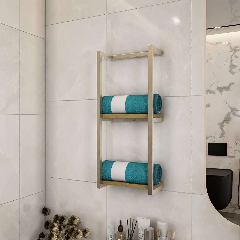 tainless steel metal bathroom shelf with a light wood base, holding neatly folded blue towels, mounted on a dark stone-tiled wall, creating a modern aesthetic