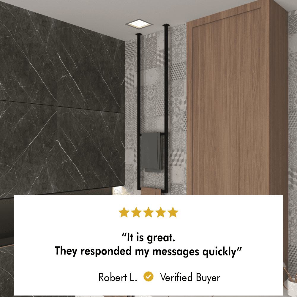 Customer review overlaying an image of a modern bathroom with a black ceiling-mounted vertical towel holder. The minimalist design is complemented by dark marble tiles and wooden cabinetry, creating a sleek and contemporary look