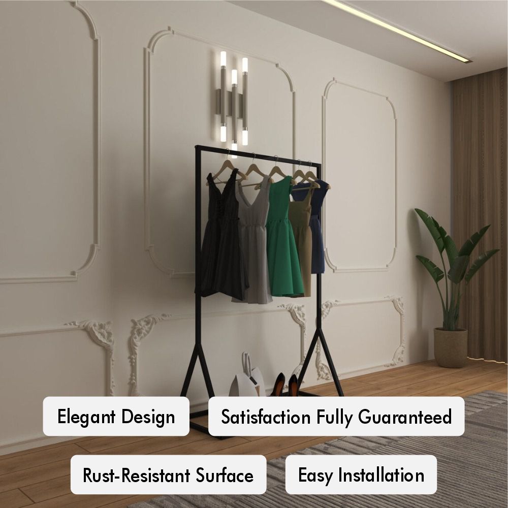 Modern free-standing clothes rail displaying various dresses in a stylish room with elegant wall moldings, featuring a minimalist black metal design with a sturdy triangular base. Highlights include easy installation, a rust-resistant surface, and guaranteed satisfaction.