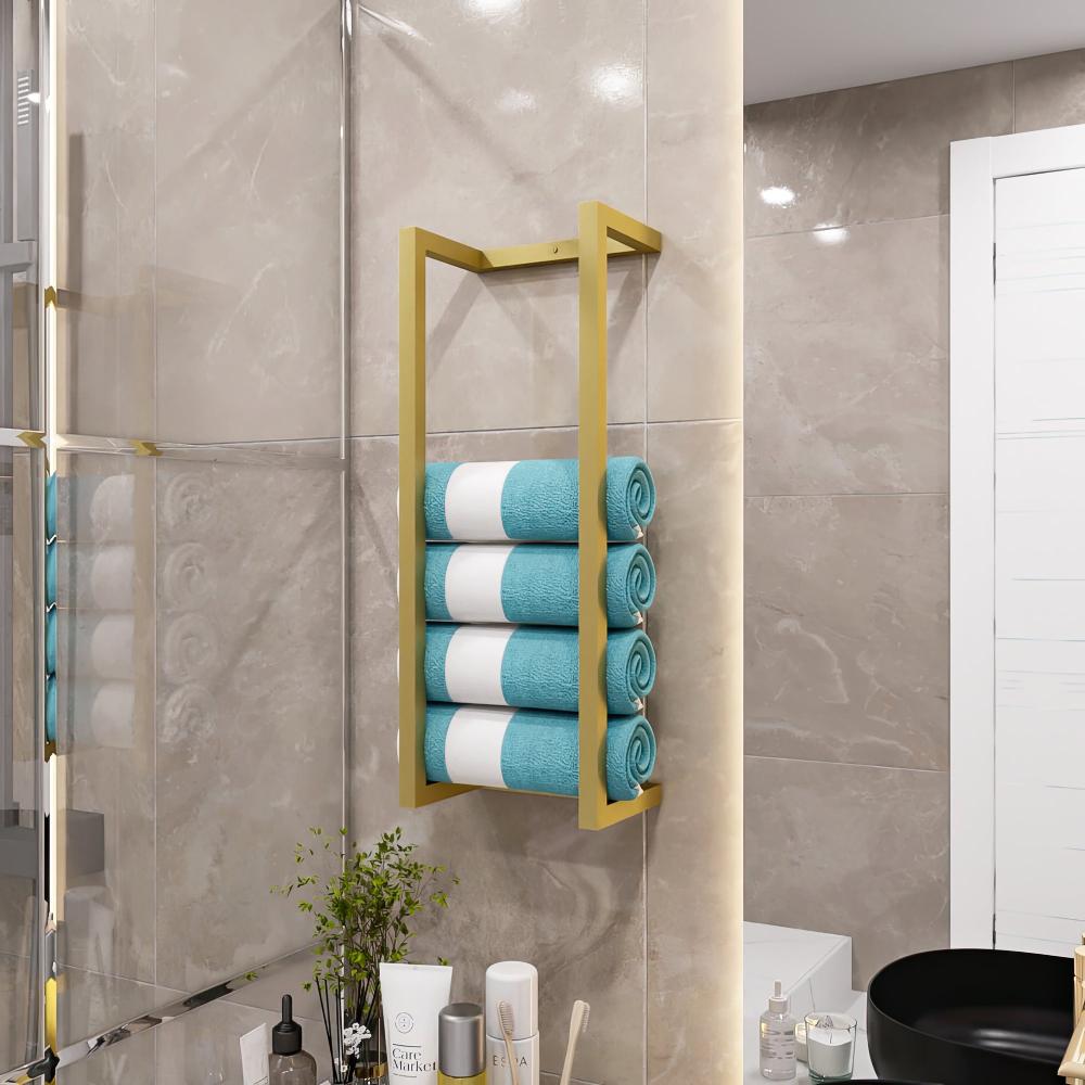 Modern gold towel and blanket storage rack in a contemporary bathroom, featuring neatly rolled turquoise and white towels. The sleek design contrasts beautifully with the neutral tiled walls, creating a luxurious and organized look. Below, a selection of bathroom essentials adds to the practical yet stylish setup.