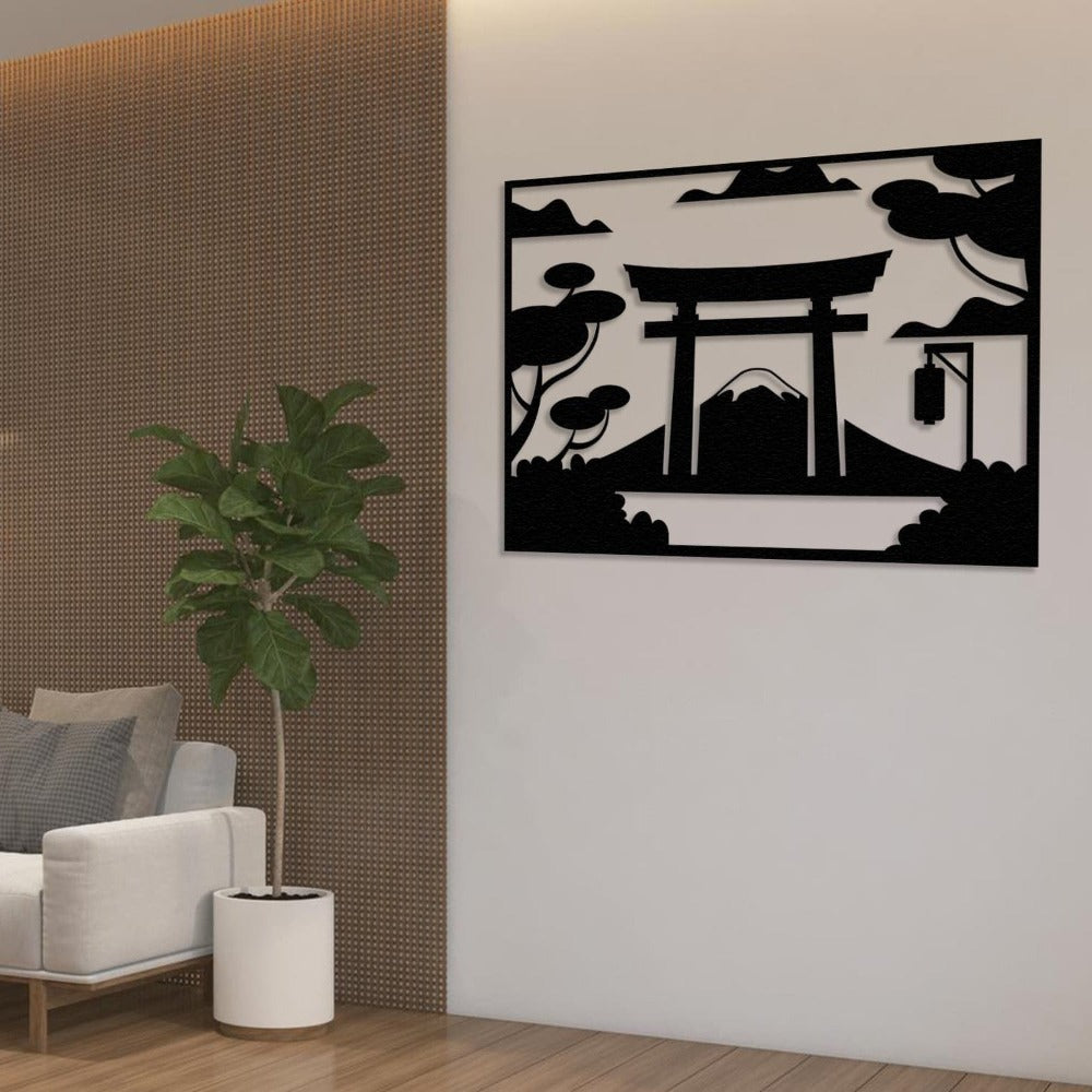  Black metal Japanese Torii gate wall art, featuring minimalist details of Mount Fuji, trees, and a lantern. Mounted on a modern living room wall with a patterned wooden background, complementing the interior design.