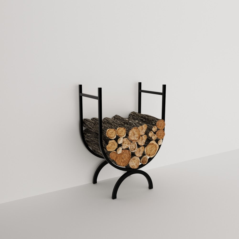 A minimalist black metal log holder with a sleek oval-shaped design, showcasing neatly stacked firewood against a white background