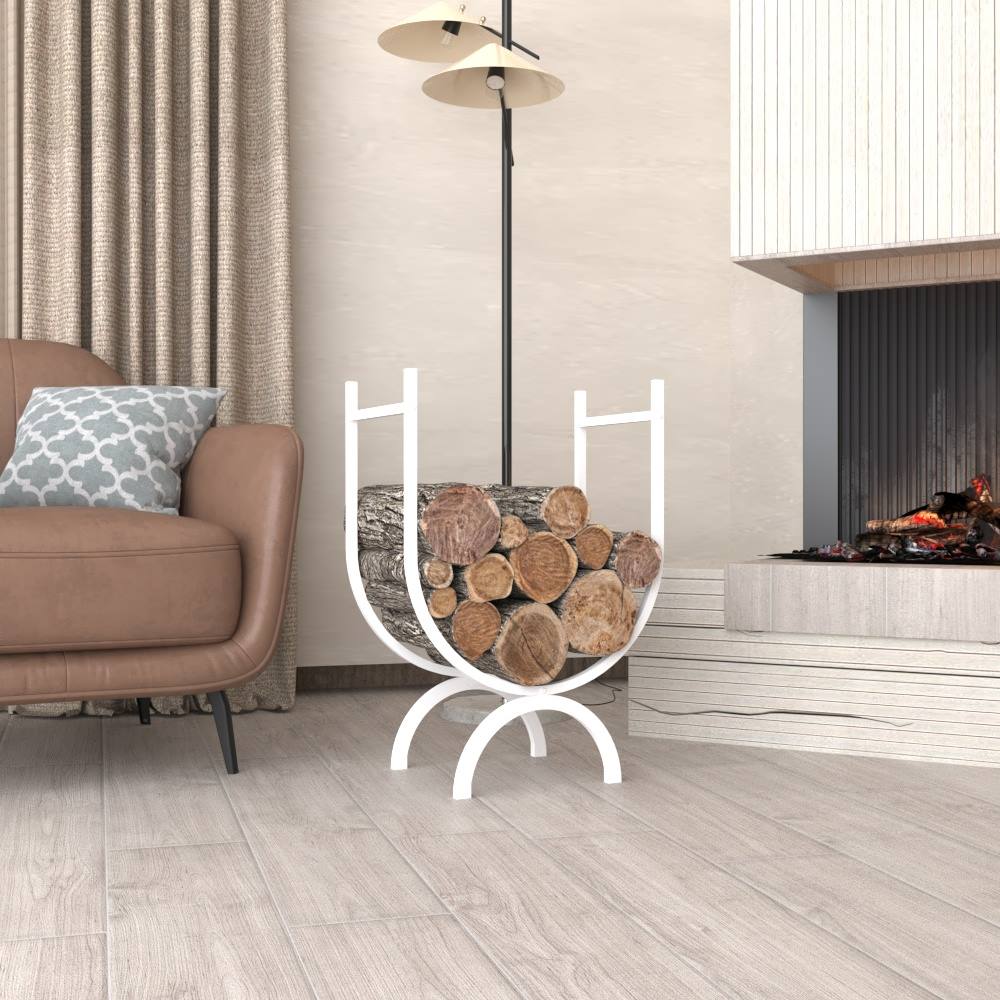 A white oval-shaped metal log holder filled with firewood, placed in a living room with a brown armchair and a contemporary fireplace