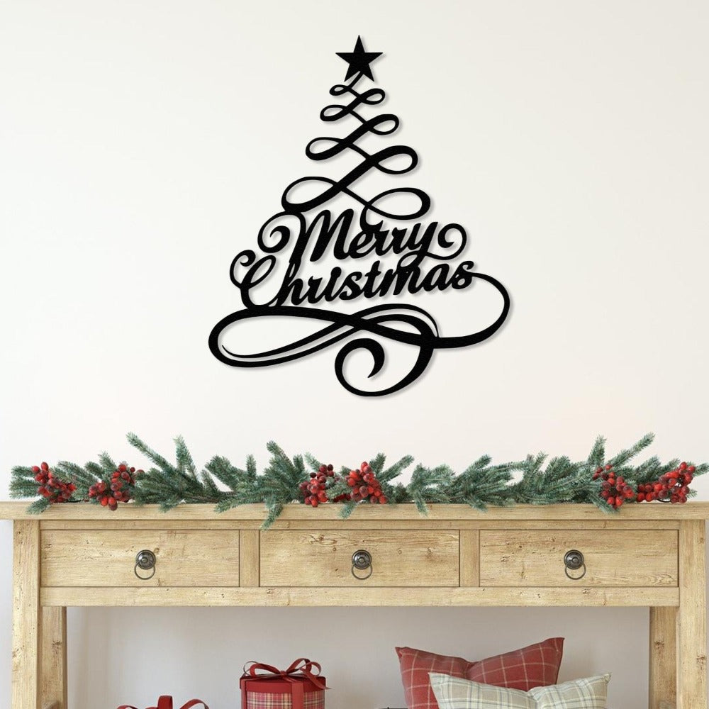 pine tree merry christmas wall art on the table