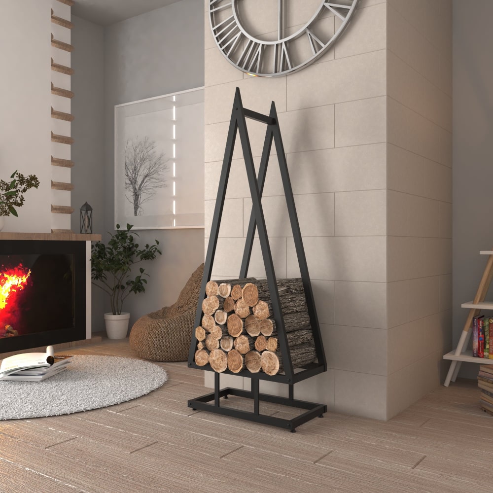 A black pine tree-shaped firewood rack placed near a fireplace in a cozy living room setting, filled with firewood