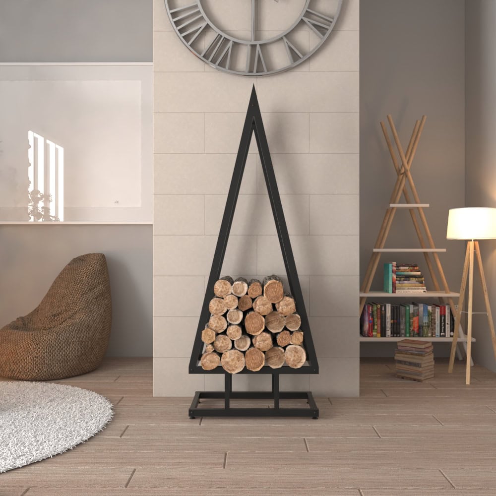 A black pine tree-shaped firewood rack with stacked logs, positioned as the centerpiece in a modern living room featuring a wall clock and bookshelf