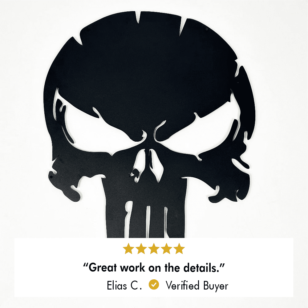 Close-up view of a black Punisher skull metal wall art with a 5-star review below reading, "Great work on the details." by Elias C., Verified Buyer.