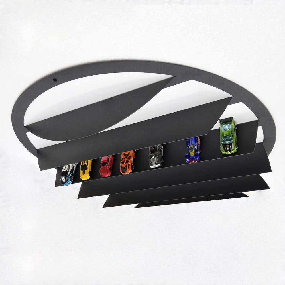 Round metal wall-mounted shelf, designed to showcase and store model cars in a sleek fashion.