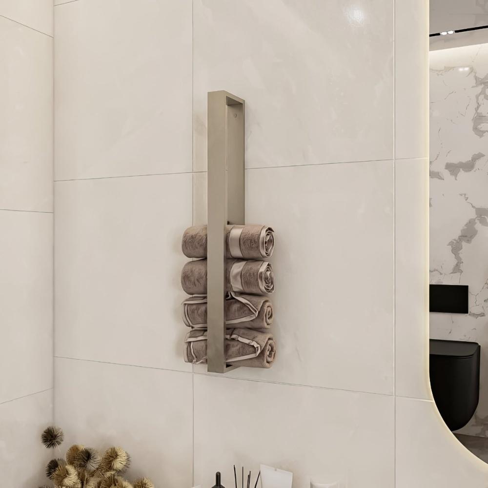 A satin nickel vertical towel rack mounted on a glossy tiled bathroom wall, holding neatly rolled towels in light brown tones, blending elegance with practicality.