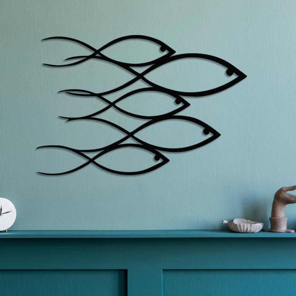 Sparkling school of fish metal wall art, perfect for adding coastal vibes to your home.