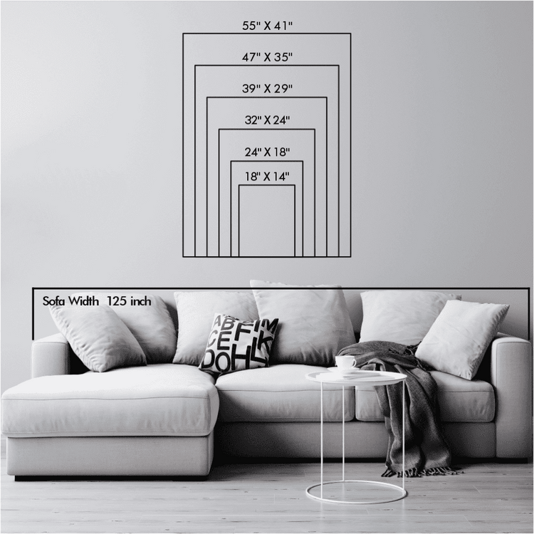 A size chart illustration showcasing various dimensions of wall art pieces, ranging from 18x14 inches to 55x41 inches, in comparison to a 125-inch sofa in a minimalist setting.