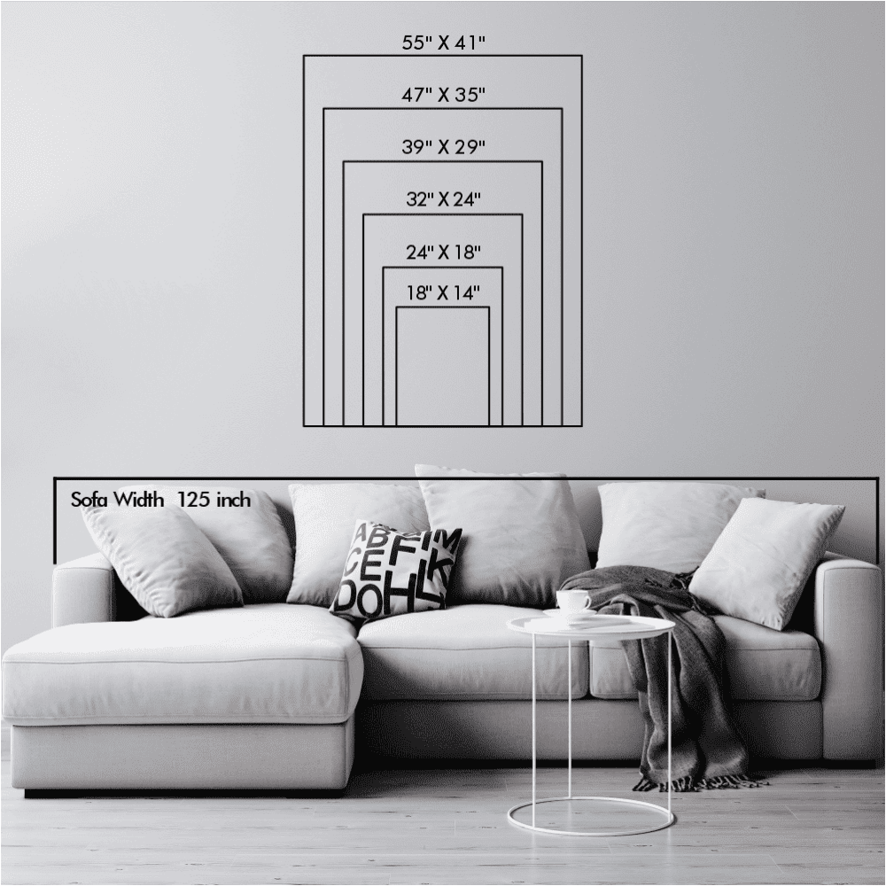 Size chart for wall art dimensions displayed over a living room setup with a white sofa. Dimensions range from 18" x 14" to 55" x 41," with a sofa width of 125 inches for scale.