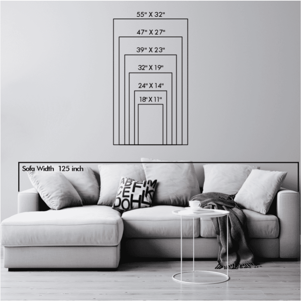 Size chart displaying six rectangular dimensions, ranging from 18"x11" to 55"x32", positioned above a 125-inch wide sofa in a minimalistic living room setting. The chart visually demonstrates proportional wall art sizes relative to the sofa width.