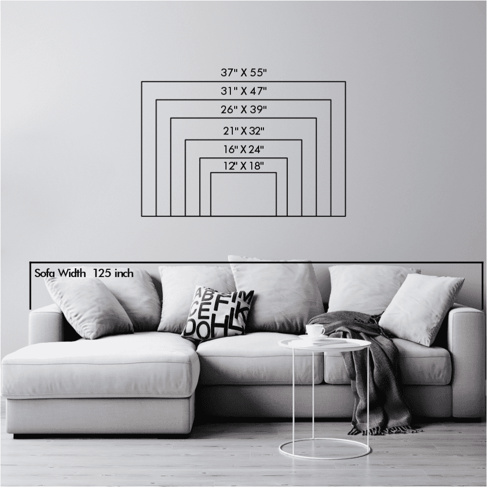 Size chart illustration for wall art displaying dimensions ranging from 12"x18" to 37"x55", positioned above a modern sofa with a width of 125 inches.