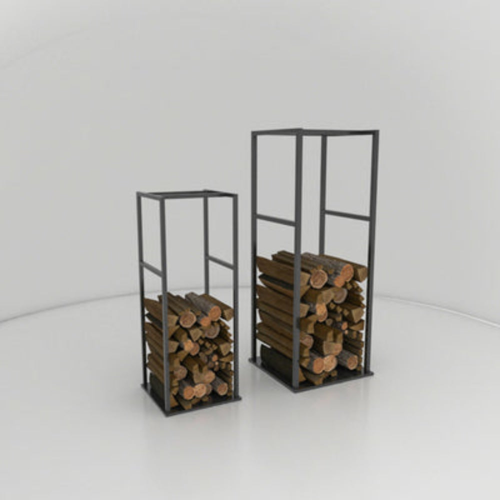 Two black metal firewood racks of different heights, each filled with neatly stacked firewood logs. The racks are placed on a white surface with a curved white backdrop, showcasing their compact and modern design.