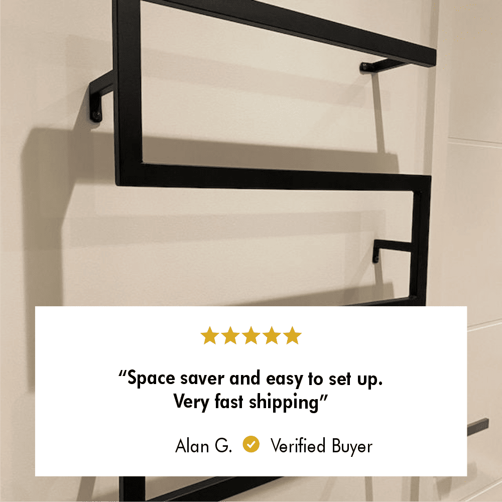 Space-saving rust-resistant metal bathroom towel holder with a five-star review from verified buyer Alan G. stating 'Space saver and easy to set up. Very fast shipping