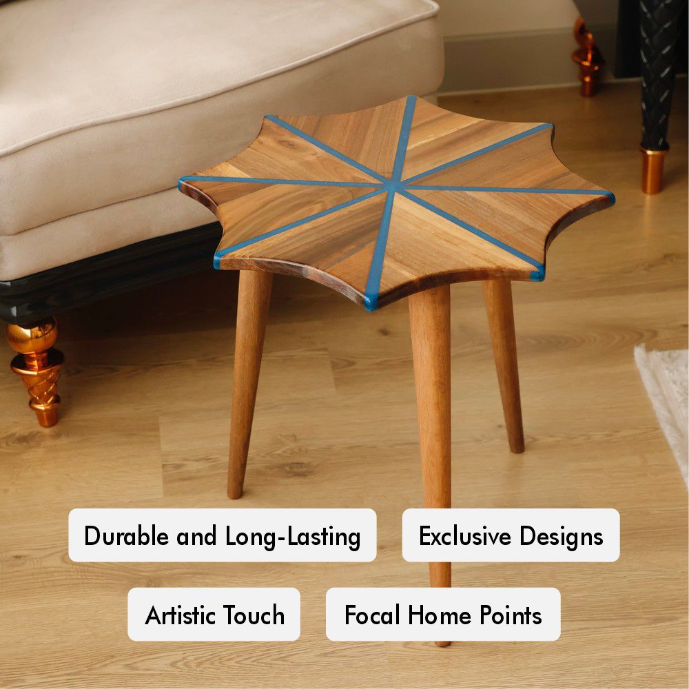 Wooden star-shaped stool with blue resin inlay detail, showcasing its elegant craftsmanship and unique geometric design.