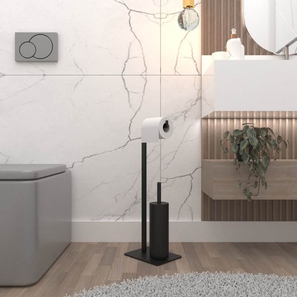 A modern black toilet paper and brush stand placed next to a minimalist bathroom vanity and toilet, featuring a sleek design against a white marble wall.