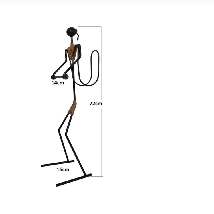 Black metal toilet paper holder in the shape of a minimalist figure, with dimensions labeled: 72 cm in height, 16 cm in width, and 14 cm in depth.