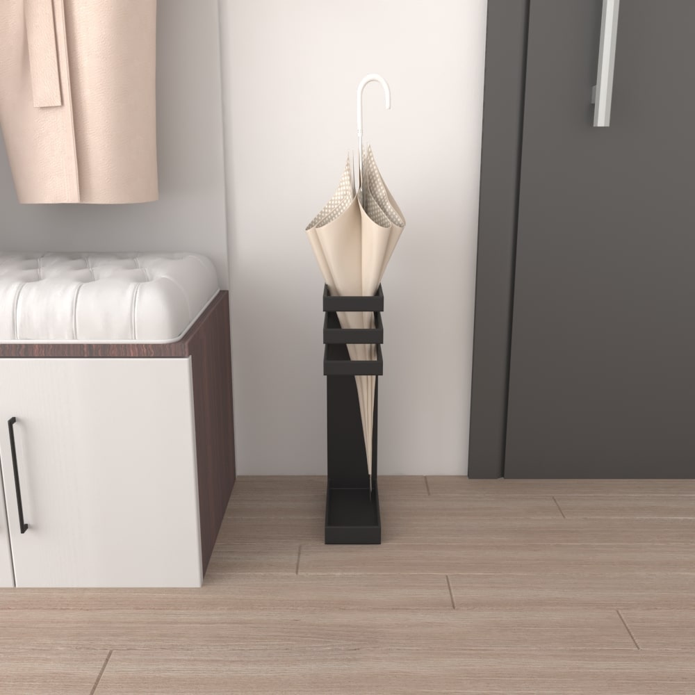 A minimalist black umbrella stand with a beige umbrella, positioned near a modern storage bench and a gray door in a stylish entryway