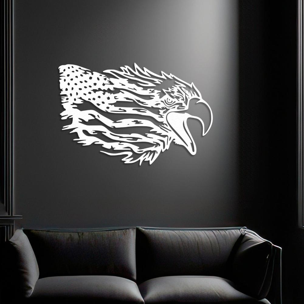 White eagle metal wall art with an American flag-inspired design, mounted on a dark black wall, adding a striking patriotic accent to a modern lounge with a black leather sofa.