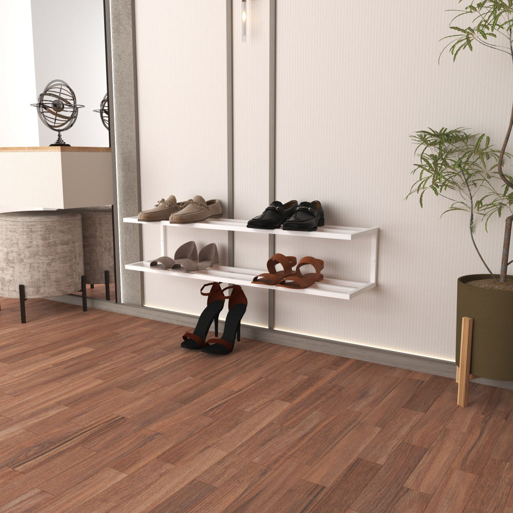 A modern white 2-tier metal shoe storage shelf mounted on the wall, holding a variety of shoes, with a minimalist background featuring light-colored walls and wooden flooring.